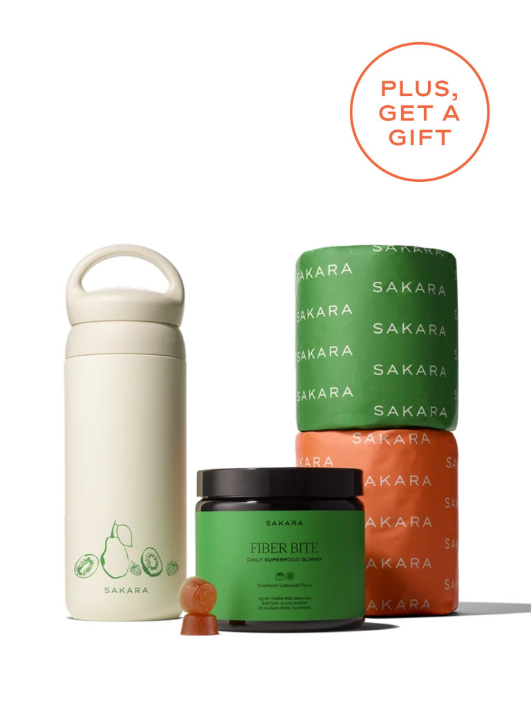 Sakara Fiber Bite, branded water bottle, and two branded toilet paper rolls