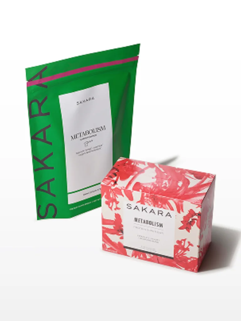 Green metabolism super powder bag with red floral Metabolism Super Bar box on white background